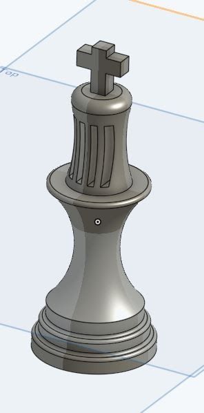 The king piece modelled in grey CAD, showing the cross, grip vents and layered base.